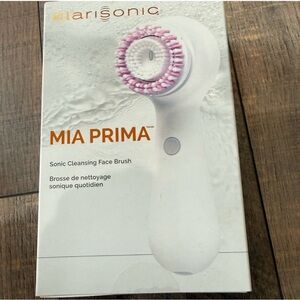 Clarisonic White and Orange Cleansing Device